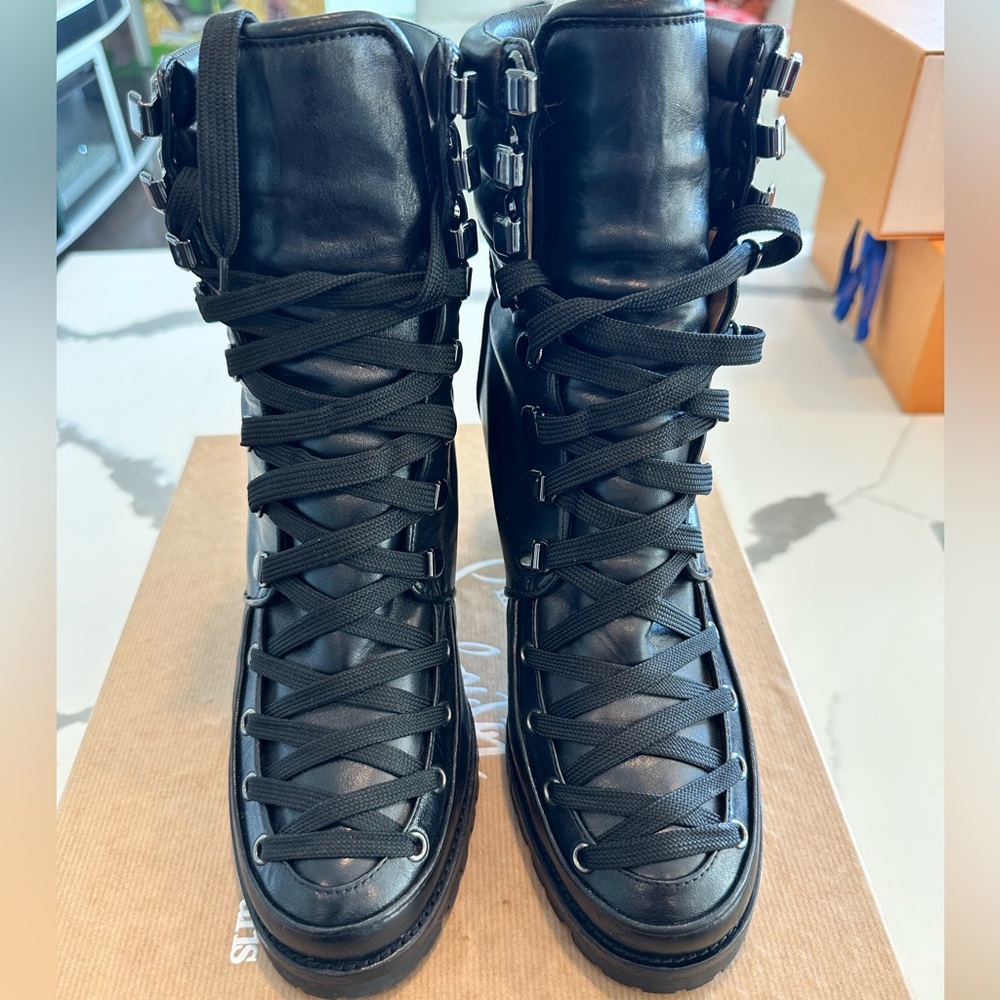 CHRISTIAN LOUBOUTIN
Lace-Up Combat Boots